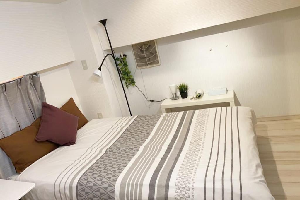 Takemura Building 104 *
